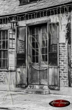 black and white front doors of the oldest pub on bourbon street new orleans louisiana