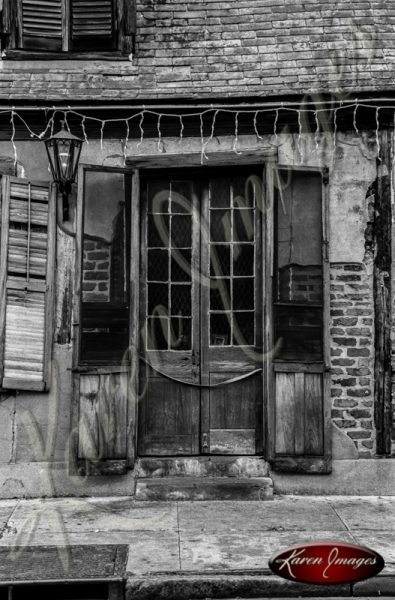 black and white front doors of the oldest pub on bourbon street new orleans louisiana