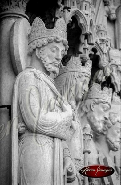 black and white image of notre dame cathedral paris france gargoyles seine