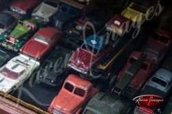 Antique Toy Cars in a Window in France
