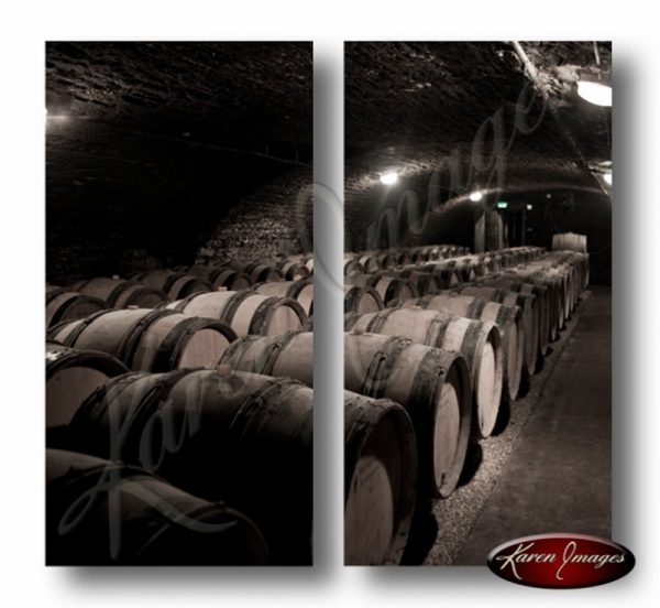 sepia image of burgundy pinot noir barrels in the caves of ropiteau meursault france