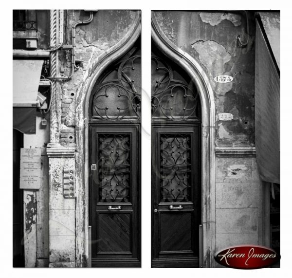 black and white image of ancient door in venice italy