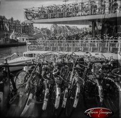 bikes in bicycle parking lot central station amsterdam