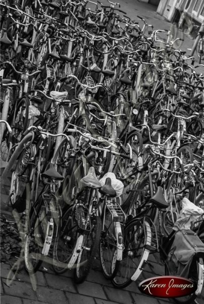 bikes in bicycle parking lot central station amsterdam