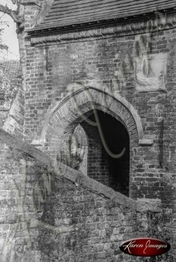 Black and white of brugge belgium ancient arch and bridge