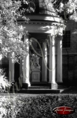 Black and white of brugge belgium statues in a gazebo rotunda