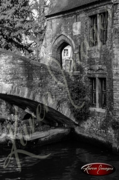 Black and white of brugge belgium cana and ancient bridge