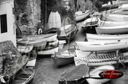 black and white image of boats cinque terre italy