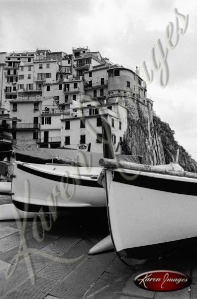 black and white image of boats cinque terre italy